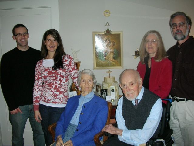 Three generations in the Home Shrine: Raymond and Eleanor Yank, Margaret and Mike Fenelon, Sarah and Jason Fenelon